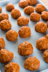 Homemade raw minced meat meatballs ready for baking in the oven