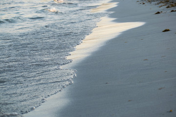 Wave on sand
