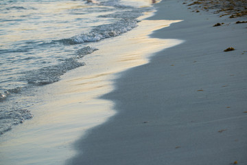 Wave on sand