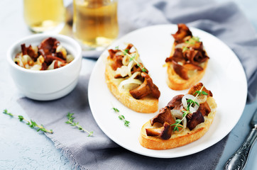 Fried chantarelle onion toasts