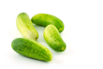 Cucumber and slices collection isolated on white background