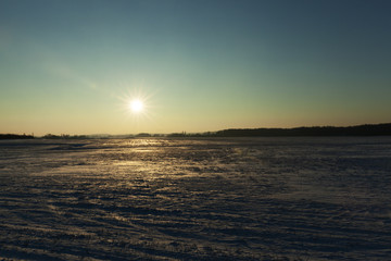 Fototapeta premium Winter landscape, the sun