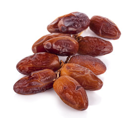 dried fruits from date palm isolated on white background