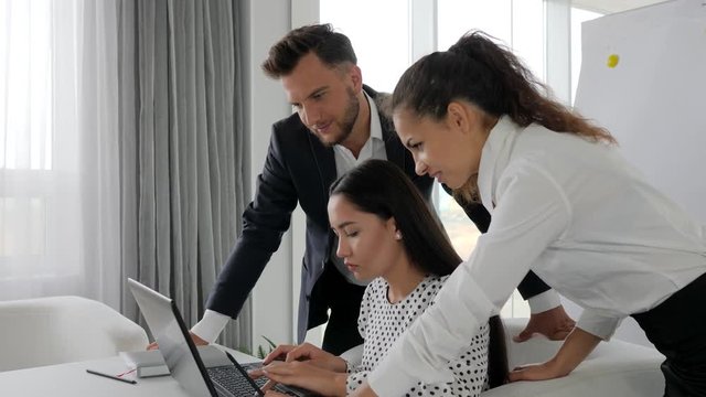 Job of collaborators on ideas business development in office space, teamwork of businesspeople on laptop in boardroom, Brainstorming office workers at computer in Business center,