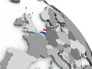 Map of Netherlands with flag on globe