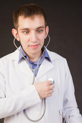 Portrait of the surprised or scared doctor