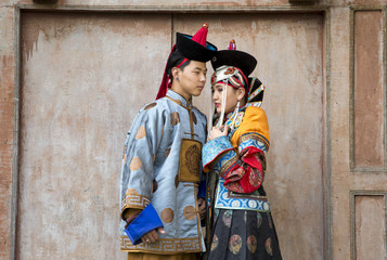Fototapeta na wymiar mongolian couple in traditional outfit