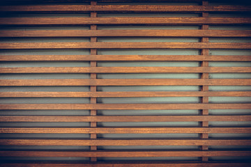 Raw wood, wooden slatted fence or lath wall background, vintage tone.