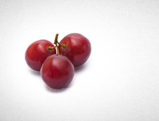 Grapes or red grapes on a background.