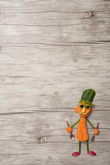 Cook made with vegetables wooden background