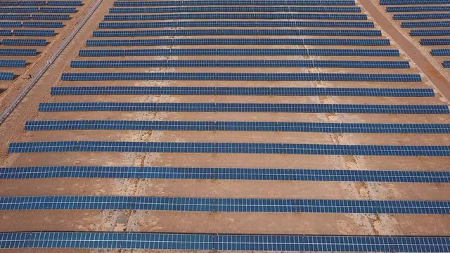 Aerial industrial view Photovoltaic solar units desert environment producing renewable energy