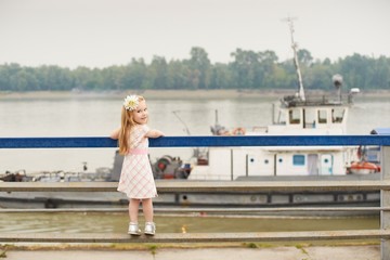 Pretty Girl. Portrait on the background of a river.