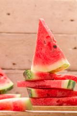 Fresh sliced watermelon  on wooden table.