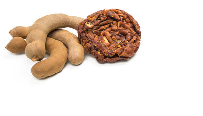 Tamarind - Sweet ripe tamarind isolated on white background with clipping path.