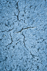 abstract surface of cracked asphalt