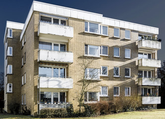 Ugly block of flats on the edge of an industrial city