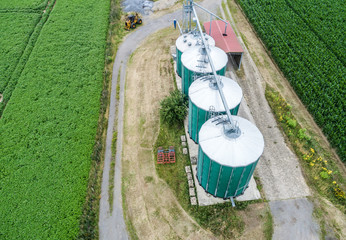 Silos in a field for storing grain, aerial view