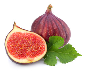 Fig fruit with green leaf isolated on white. Clipping Path