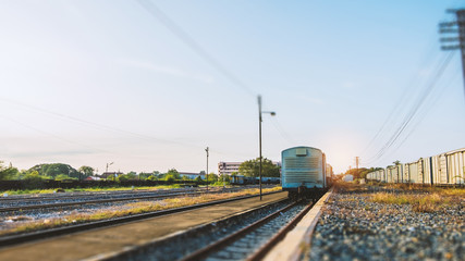 Tilt-shift effect selective focused on Old container on the railway at train station
