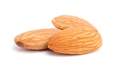 Group of almonds isolated on white background