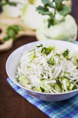 Salad with kohlrabi, cucumber and dill.