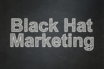 Business concept: Black Hat Marketing on chalkboard background