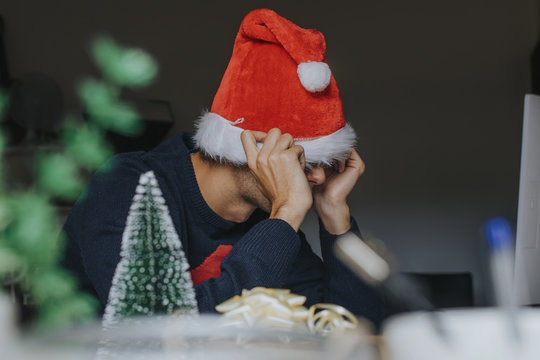 young studying or in the office stressed, overwhelmed or tired