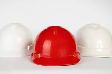 Three construction helmets
