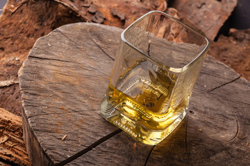 Whiskey on tree stump