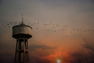 Water Tank Tower with sunset