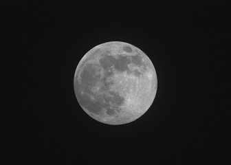 Full Moon photographed through a telescope. 