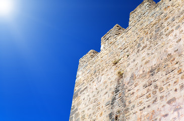 Stone wall and blue sky , background