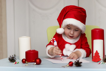 Little kid are writing letter to Santa