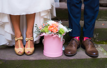  Stylish legs newlywed with a box of flowers