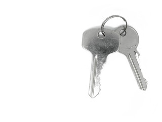 Top view two shiny silver color iron steel keys with ring, on white background isolated, with clipping path