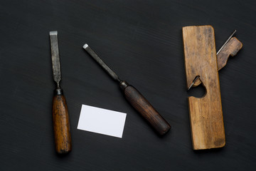 joiner tools on dark wooden table background