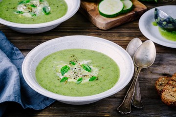 green vegetable cream soup puree with zucchini and basil