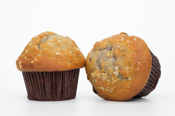 Blueberries muffin on white background.