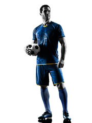 Obraz premium one caucasian soccer player man standing in silhouette isolated on white background