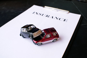 Car insurance concept with policy.