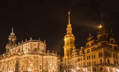Fototapeta na wymiar Catholic cathedral white the castle beside it in Dresden by night, Hofkirche, Germany