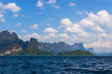Obraz premium Beautiful mountains lake river sky and natural attractions in Ratchaprapha Dam at Khao Sok National Park, Surat Thani Province, Thailand