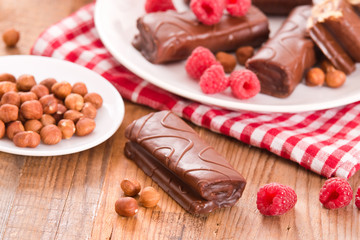 Chocolate rolls with hazelnuts and raspberries.