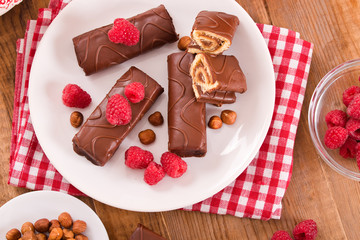 Chocolate rolls with hazelnuts and raspberries.