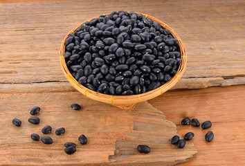 Black bean on wooden floor