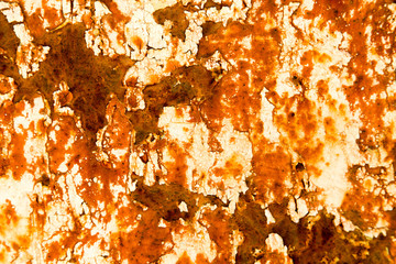 background of rusty metal painted with cracked paint