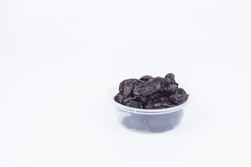 Concept Sweet dry raisins black and yellow isolated on the white background