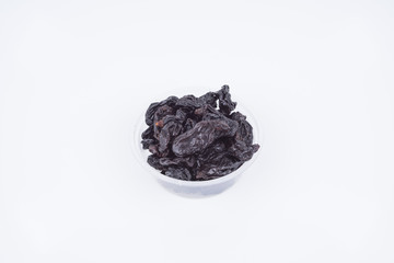 Concept Sweet dry raisins black and yellow isolated on the white background