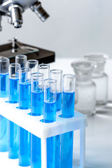 Laboratory, chemistry and science concept on white background
