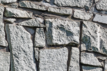 Stone texture. Abstract background of old cobblestone pavement close-up